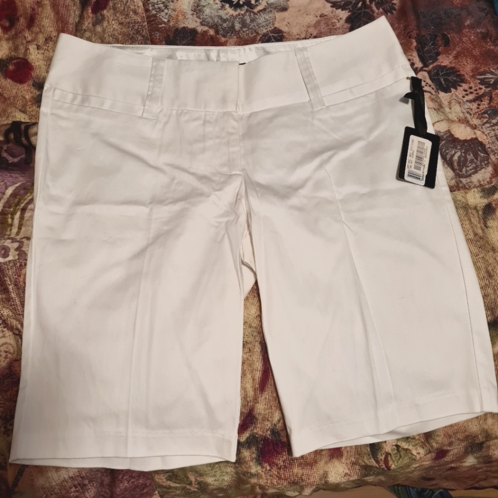 New dressy, classy white long shorts by Stoosh size 11.